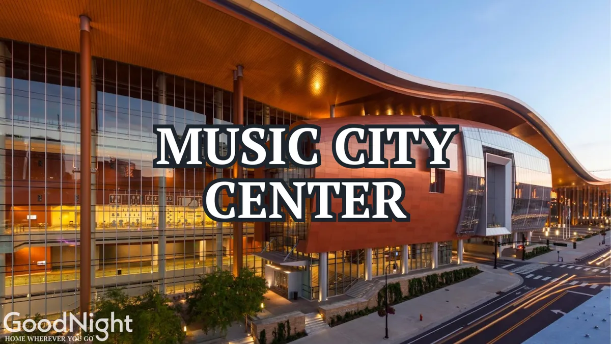 This image showcases the exterior of the Music City Center, one of Nashville’s major event venues, along with surrounding greenery and a lively street view. The building’s modern architecture is prominent, set against the context of the city.